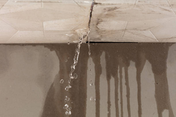 Professional Burst Pipe Cleanup technician working in Clinton, AR